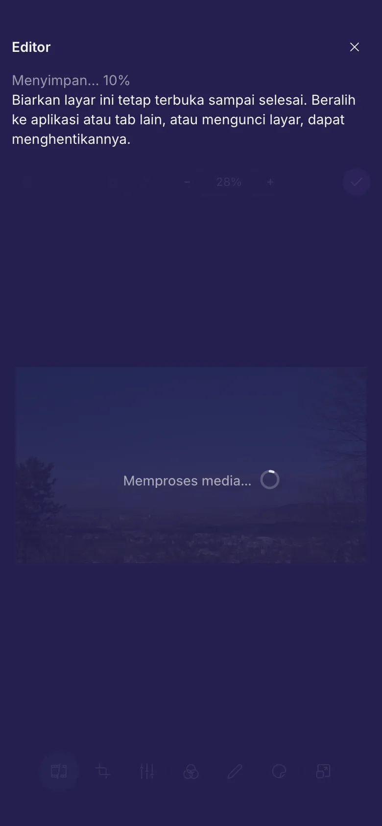 Editor sedang menyimpan video, dengan catatan untuk membiarkan layar tetap terbuka